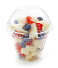 fresh fruit pieces salad in plastic cup