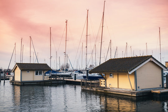 Marina with yachts and floating houses