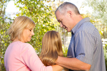 Fototapeta premium Parents talking with their teenage daughter.