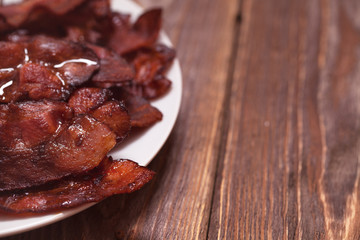 plate with fried bacon