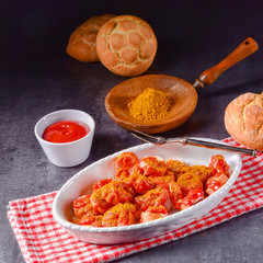 sausage in curry sauce