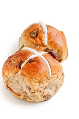 Freshly Baked Hot Cross Bun on White Background