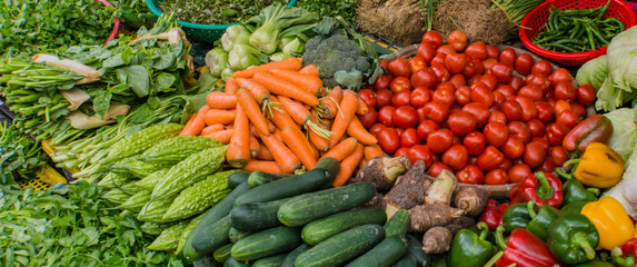 market stall with many vegetables