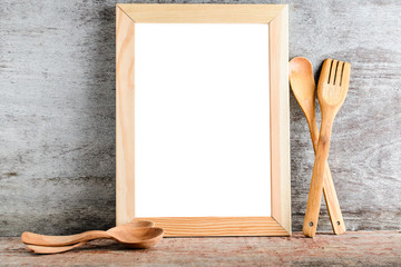empty wooden frame and kitchen accessories.