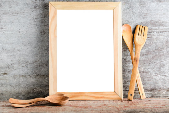 empty wooden frame and kitchen accessories.