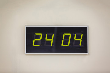 Black digital clock on a white background showing International Day of Youth Solidarity