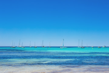 Es Trenc - amazing beach with beautiful clear water and lots of yachts, Mallorca Island, Spain