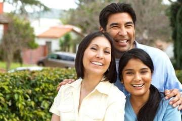 Hispanic family with a teen daughter.