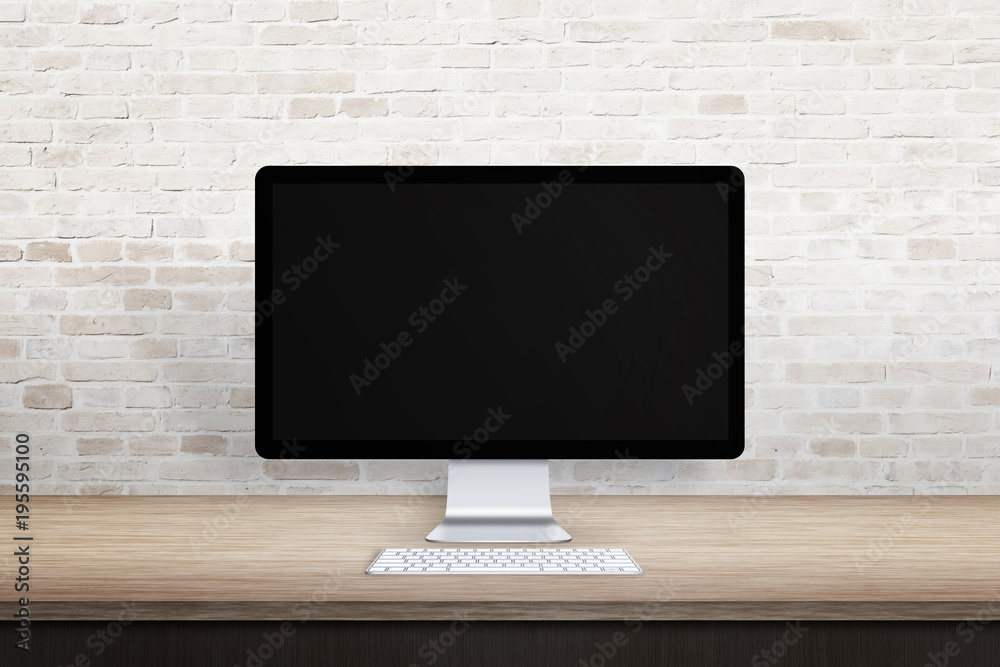 Poster Clean workplace with computer display. Blank screen for web site promotion. Empty desk and brick wall.