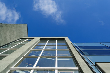 Fototapeta na wymiar Blue sky and top of the buildings