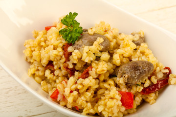 Bulgur with chicken hearts