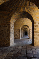 beautiful stone building, a long dark tunnel