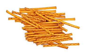 Salty cracker pretzel sticks isolated on white background, top view