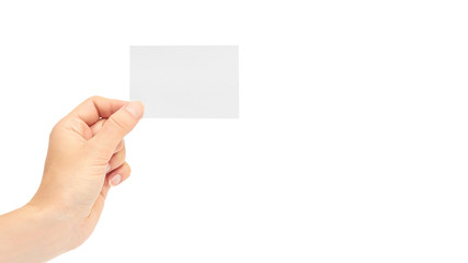 Obraz premium Female hands hold a business card. Isolated on white background. copy space, template