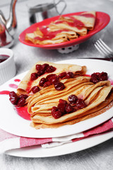 Russian pancakes with cornelian cherry jam