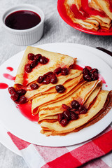 Russian pancakes with cornelian cherry jam