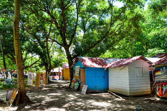 Caribbean market on the island Cayo Levantado, Dominican Republic, colored huts