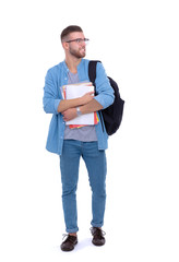 A male student with a school bag holding books isolated on white background. Education opportunities. College student.