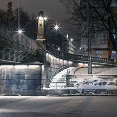 Turku by night. Urban landscape with frozen river.