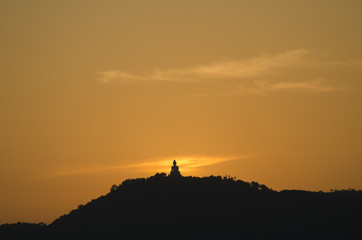 sunset back big buddha at Phuket