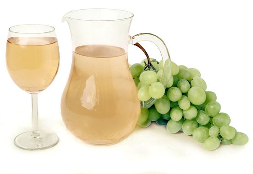 white grapes and jug of wine
