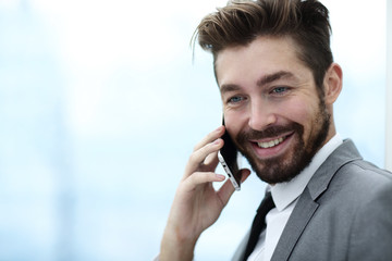 Business man talking on mobile phone