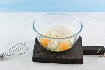 Mix for baking. In a deep bowl eggs, cottage cheese, sugar. Close to the whisk for knocking. Light...