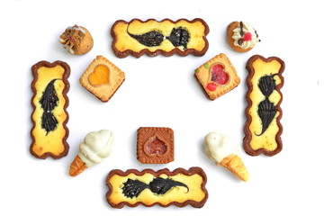 Assortiment homemade patterned cookies. In the shape of a heart. White background