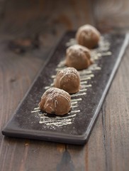 truffle chocolates on dark background