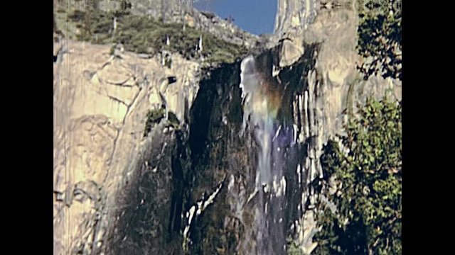 Bridalveil Fall in the Yosemite National Park in California state, United States. Vintage holiday footage in circa 1980.