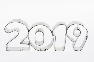 Text two thousand nineteen in insulated metal figures.