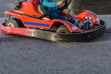children go for a drive on karting