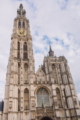 Fototapeta na wymiar Cathedral of Our Lady in Antwerp, Belgium Onze-Lieve-Vrouwekathedraal under clear blue sky in sunny good weather day in autumn