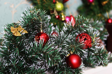 Obraz na płótnie Canvas Fir-tree with Christmas toys. New Year decoration. A Christmas decorative of A Christmas tree with a beautiful bokeh background