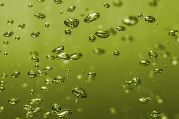 bubbles of different color in the water bright high lights