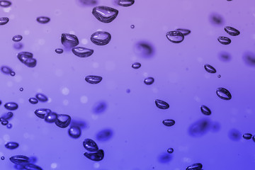 bubbles of different color in the water bright high lights