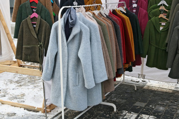 Old unfashionable coats and jackets are distributed free of charge
