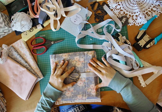 handmade creating of the diary from special scrapbooking paper