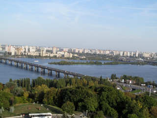 Panorama of Kiev with Paton Bridge across the Dnieper River. Kiev cityscape is made from the observation deck of the The Motherland Monument