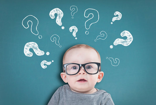 Thinking baby with question marks on background