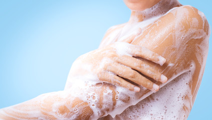  A woman is taking a shower.