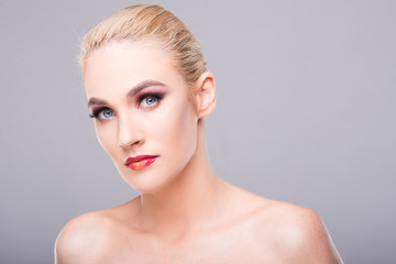 Attractive young model posing wearing glam make-up.
