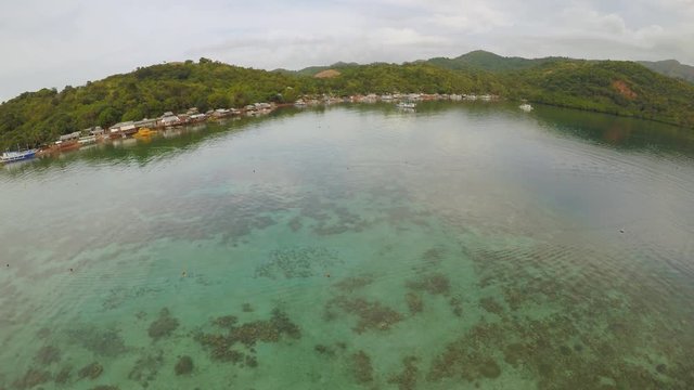 Aerial view of small islands Siete Pecados near in Coron Bay. Palawan. Overcast.