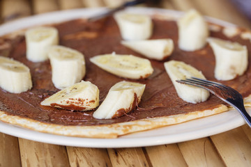 pancake with chocolate and banana