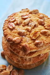 top view of cookies with peanuts on the flour