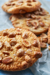 close up cookies with peanuts on the flour