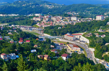 Aerial view of green valley near Black Sea in Sochi in summer