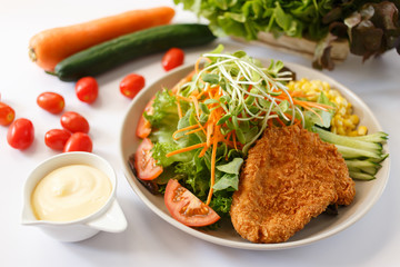 Top view Fresh healthy caesar chicken salad on white background.