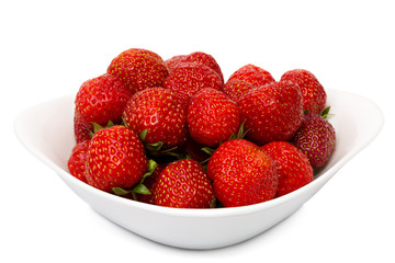  Strawberries berries on a white plate isolated on white background