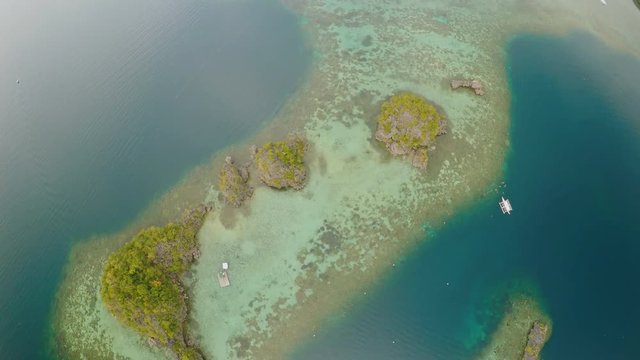 Aerial view of small islands Siete Pecados near in Coron Bay. Palawan. Overcast